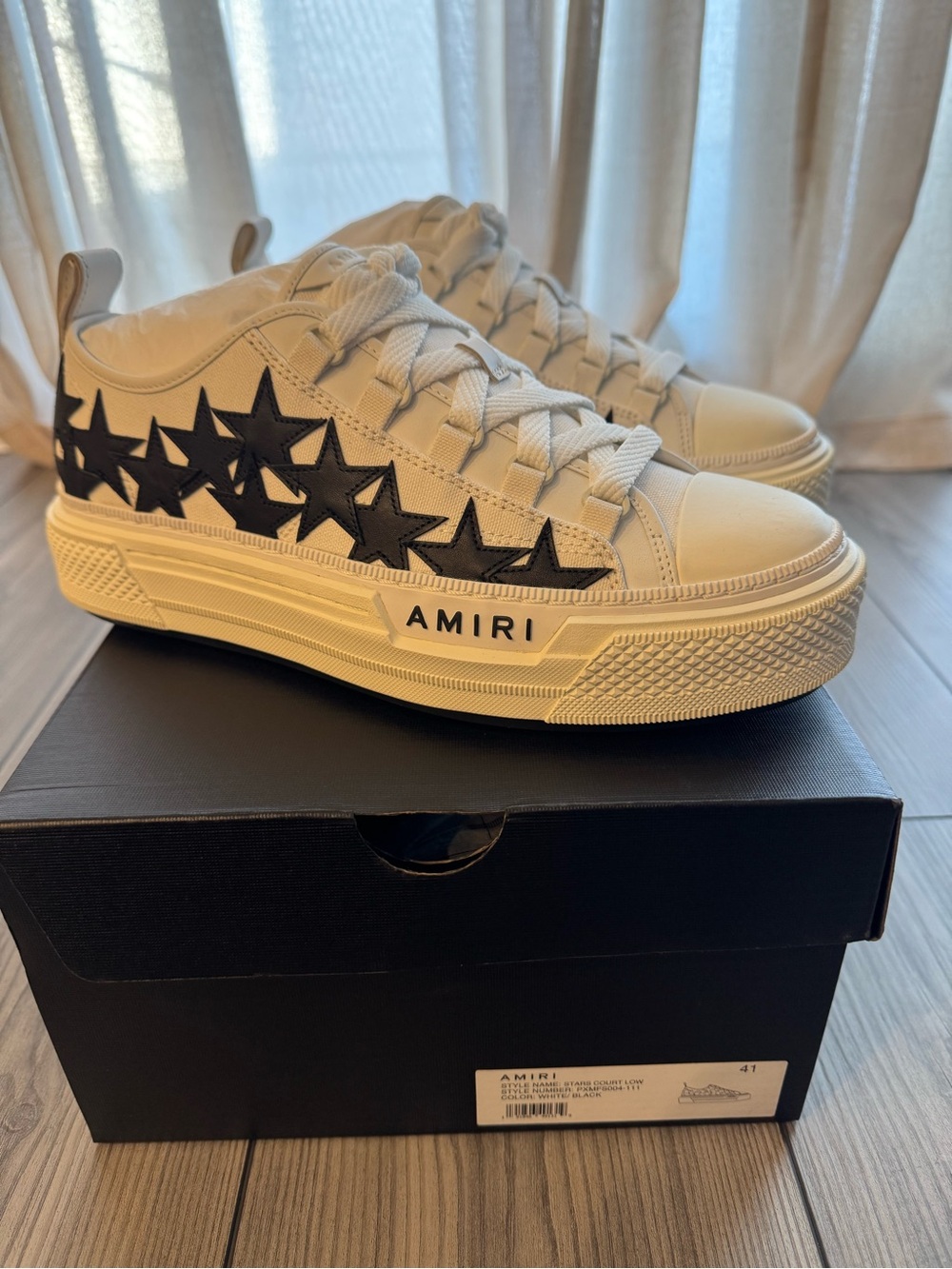 AMIRI White Sneakers with Black Star Appliqué
